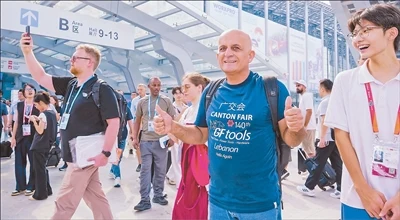 International visitors walking through the Canton Fair complex